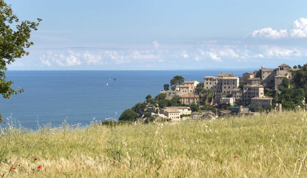 كوبرا ماريتيما Residence I Delfini المظهر الخارجي الصورة